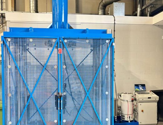Blue Vertical test machine with full guarding - next to a smart white hydraulic power pack