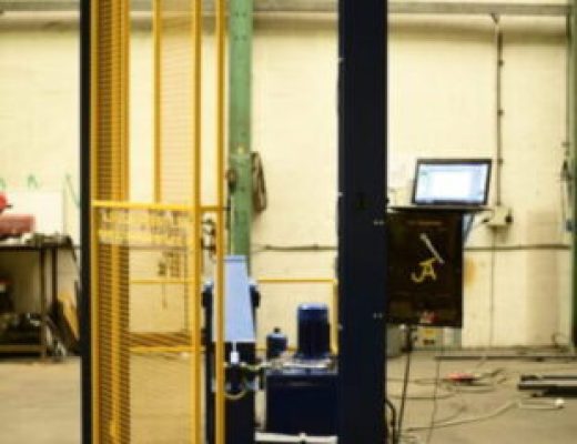 Hoist Test Machine - black with open yellow mesh guard